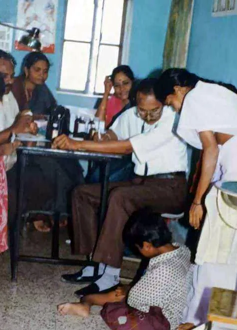 Checking blood pressure at a health camp