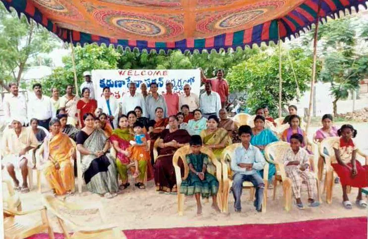 Open-air health camp under a shamiana